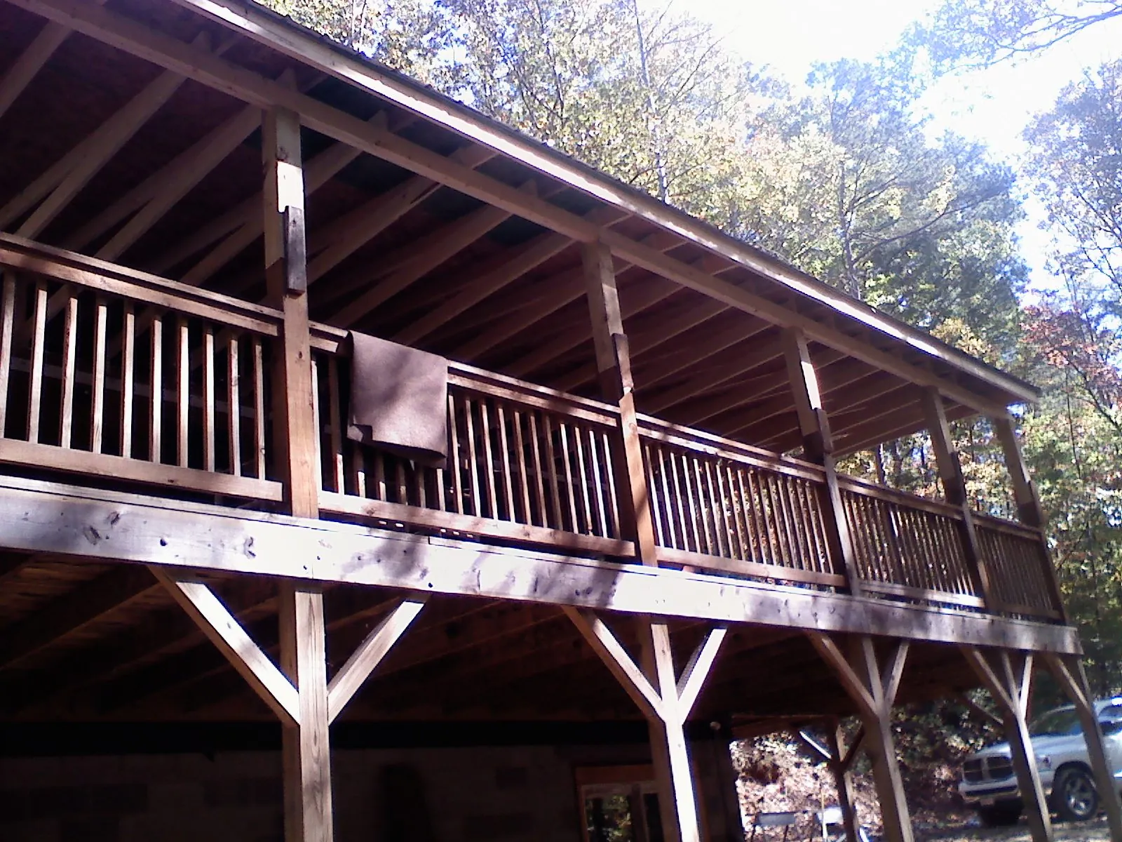 Timber framing under a new elevated porch and deck — Roof Leak Repair in Waukon by Roofing Brothers